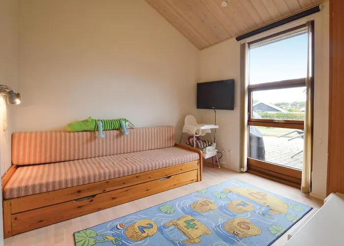 Three-bedroom In Hébergement de vacances *